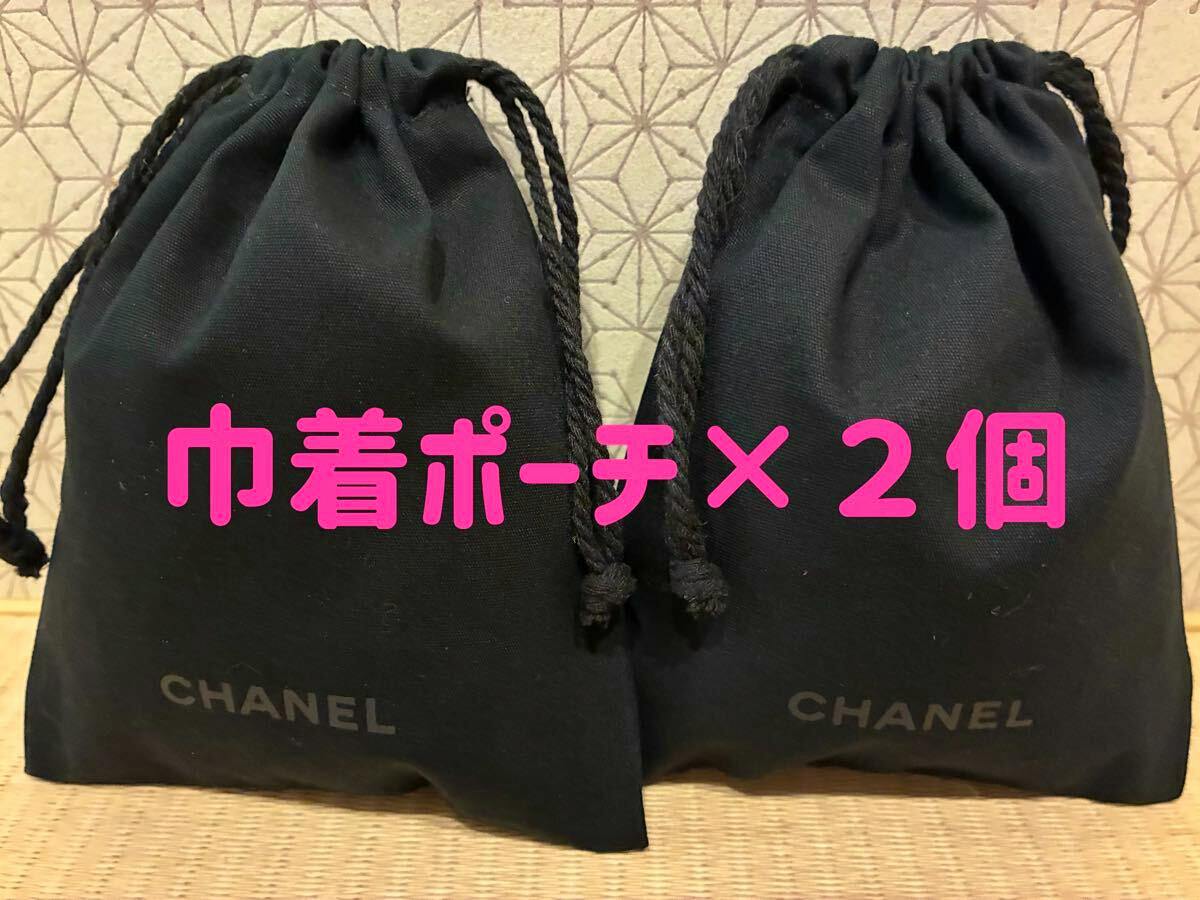 Two black CHANEL drawstring pouches shown side by side with overlaid pink text indicating a two-piece set.