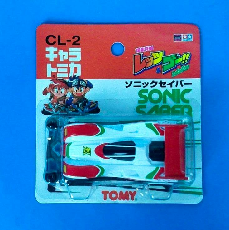 Carded blister-pack showing the Tomy Chara Tomica Sonic Saber toy car in its original packaging.
