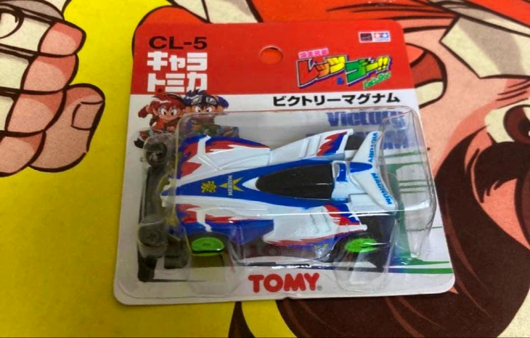 An unopened キャラトミカ CL-5 Victory Magnum metal toy car in its TOMY blister packaging.