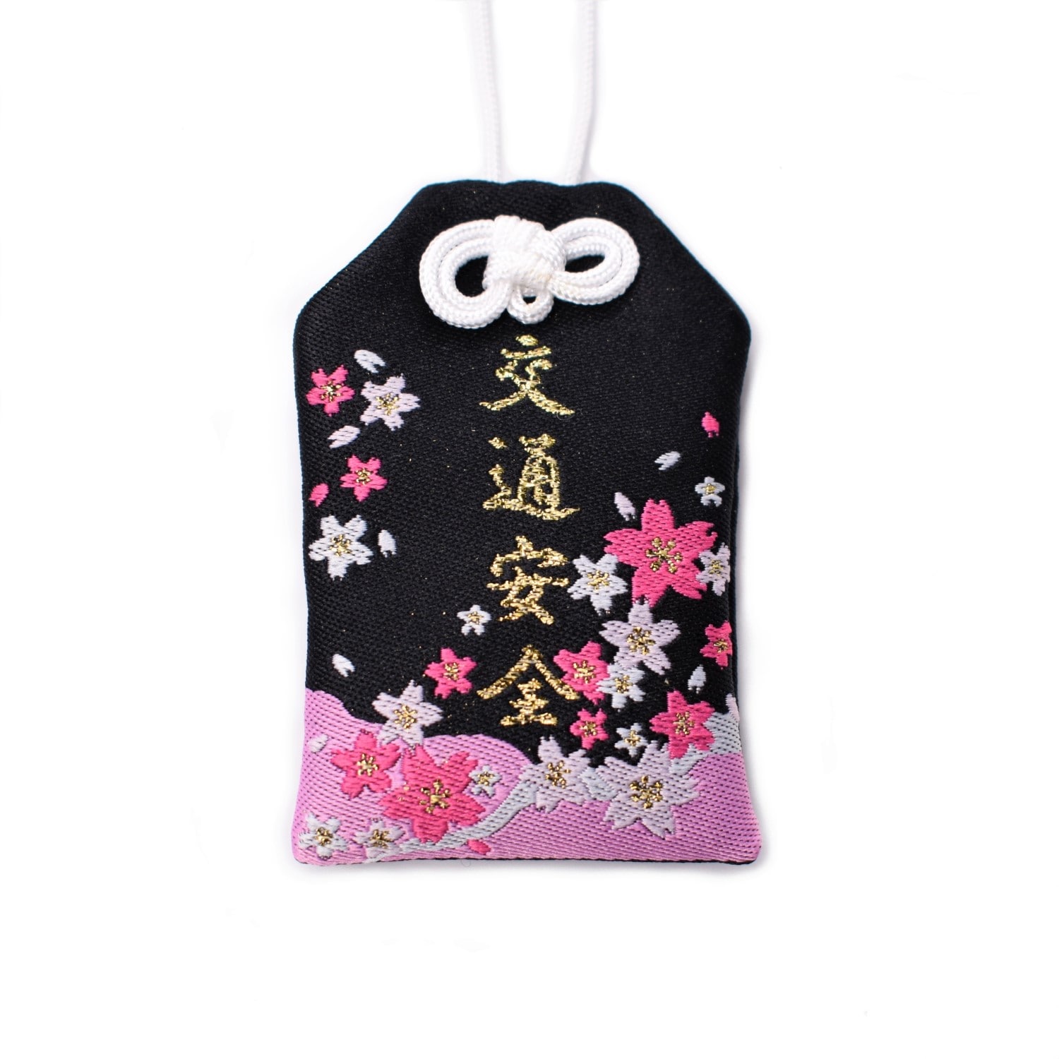 Photograph of the black sakura-patterned traffic-safety cloth amulet (omamori) with gold embroidered characters and a white cord.