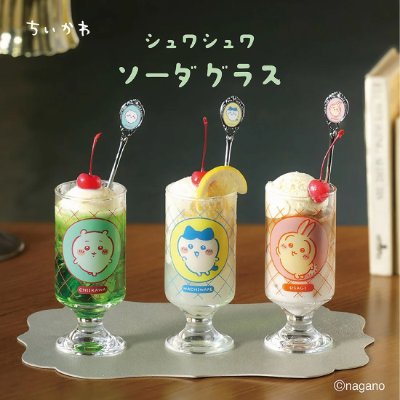 Three pedestal soda glasses with Chiikawa character illustrations, each filled with a beverage and garnished, displayed on a tabletop.