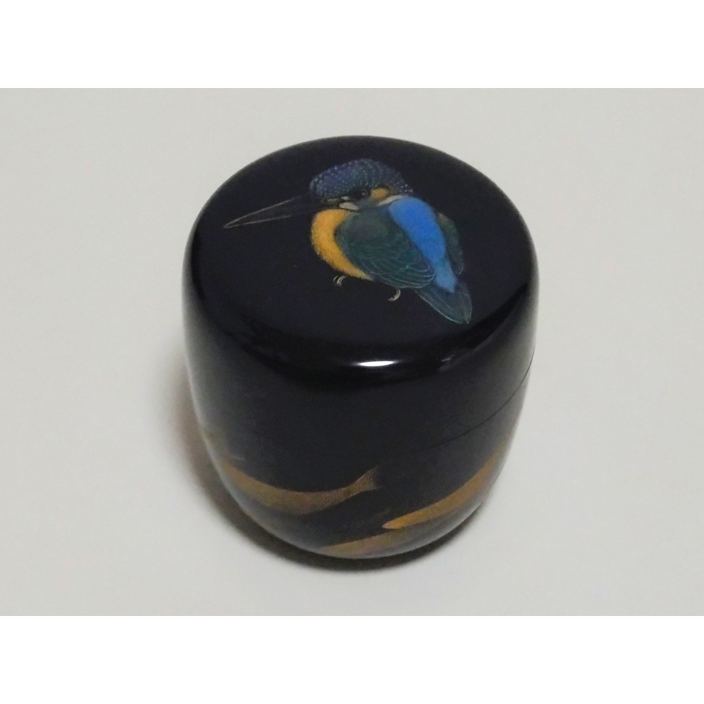 Round wooden box with black lacquer and a colorful bird painted on the lid.