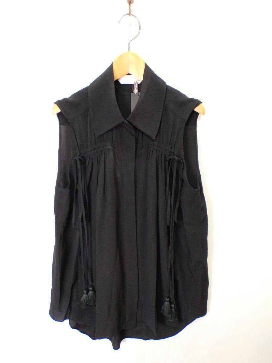 Front view of a black sleeveless Chloe silk blouse with tassel ties, displayed on a hanger.