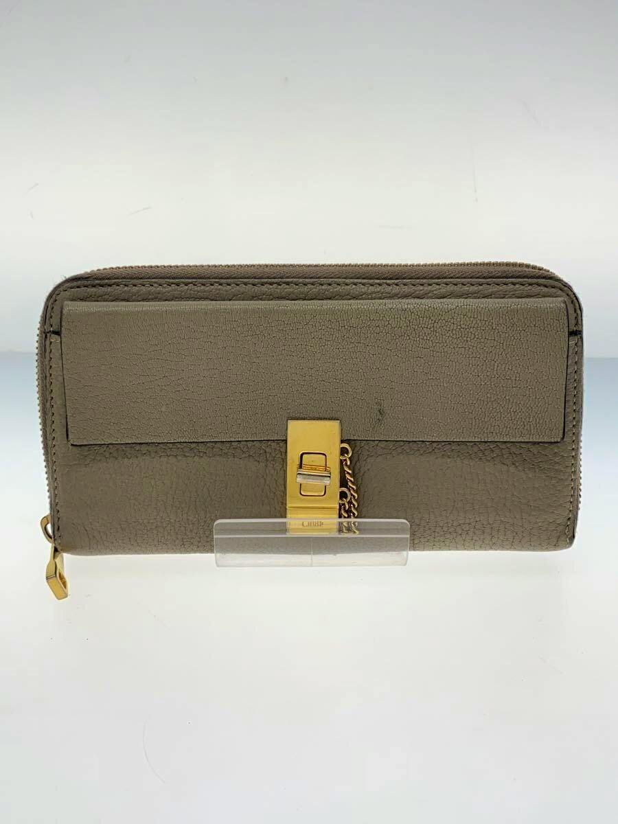 Front view of a Chloe long cow leather women's wallet with a gold-tone clasp and zip closure displayed on a clear stand.