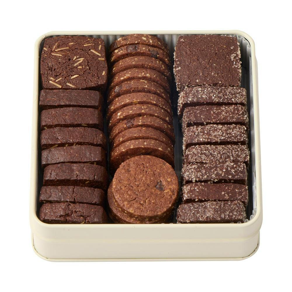 Open cookie tin showing three rows of chocolate cookies arranged inside.