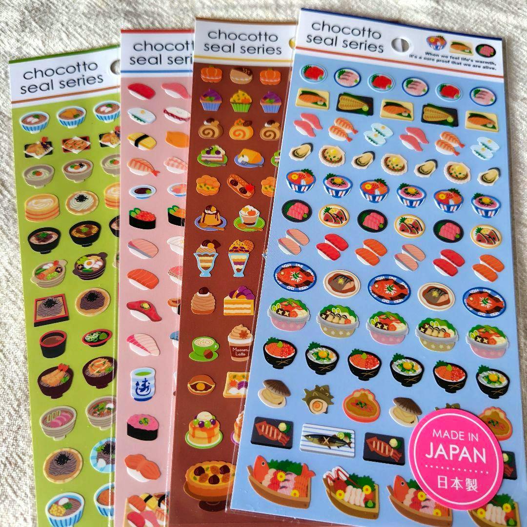 Four chocotto seal series sticker sheets with colorful food-themed stickers fanned on a light textured background.