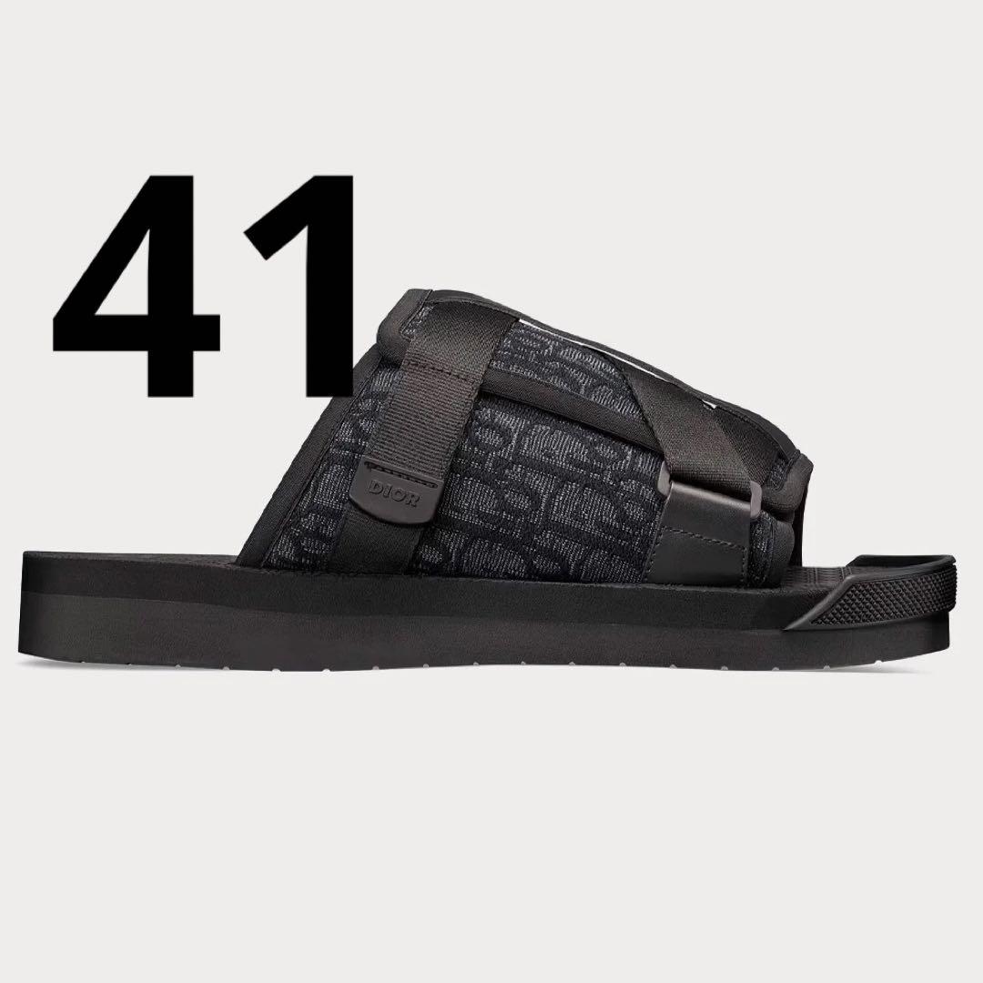 Side view of the Christian Dior Alpha black rubber sandal showing the patterned strap and rubber sole with a large '41' size mark in the image.
