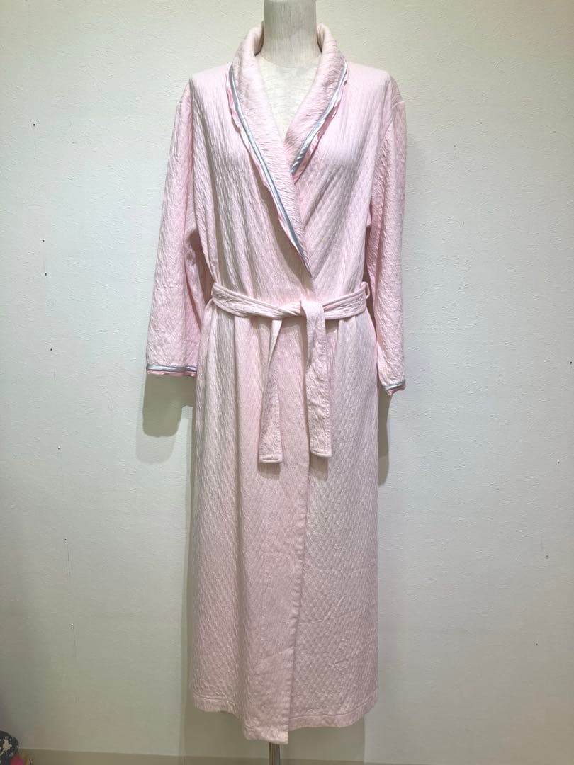 Pink Christian Dior dressing gown (size M, 100% cotton) shown on a mannequin against a plain wall.