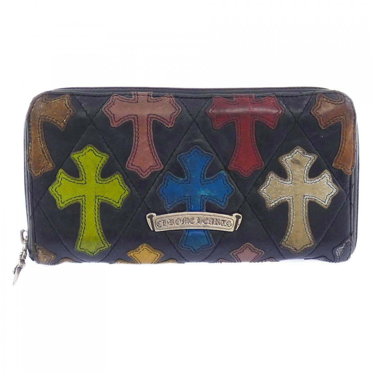 Front view of the cow leather wallet showing multicolor cross patches and a metal Chrome Hearts logo.