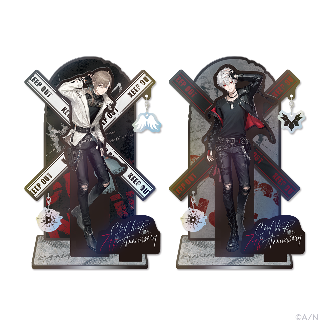 Two acrylic stand displays from the ChroNoiR 7th Anniversary design showing illustrated characters on decorative bases.