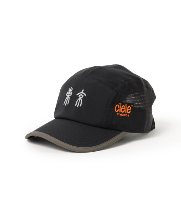 Black ciele athletics baseball cap with gray brim trim, orange "ciele" logo on the side, and white stylized characters embroidered on the front.