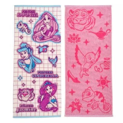 Two face towels shown side-by-side: the left towel has sticker-style princess illustrations (Rapunzel, Cinderella, Jasmine) and the right towel has pink silhouette motif designs.