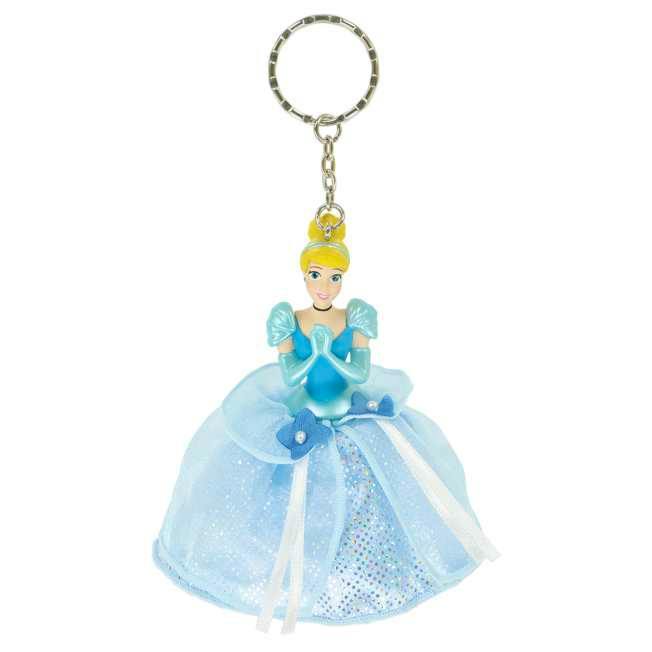 Plastic Cinderella keychain with a blue dress and attached metal keyring shown on a white background.