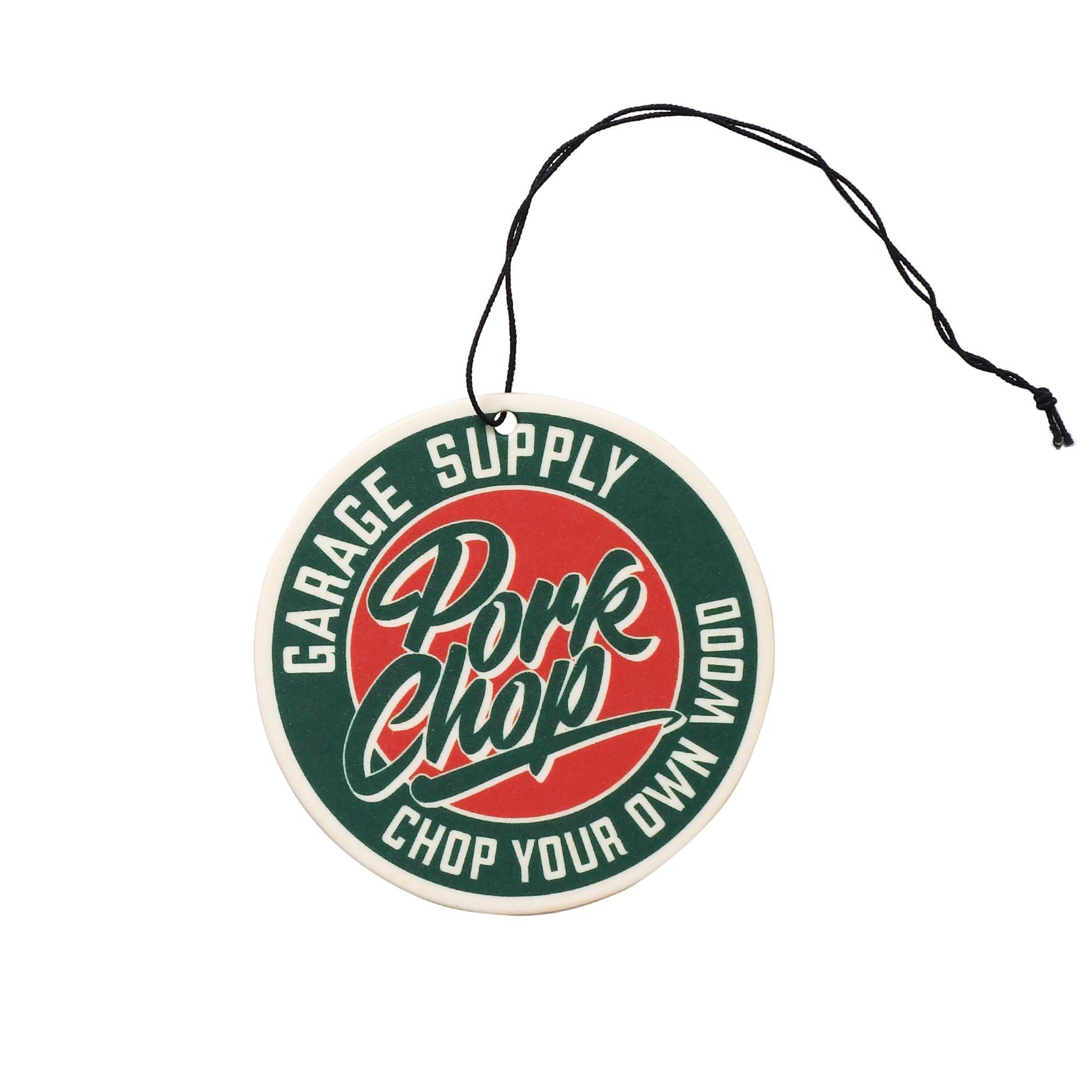 A round paper room air freshener showing a red and green "Pork Chop" graphic with a black hanging string.