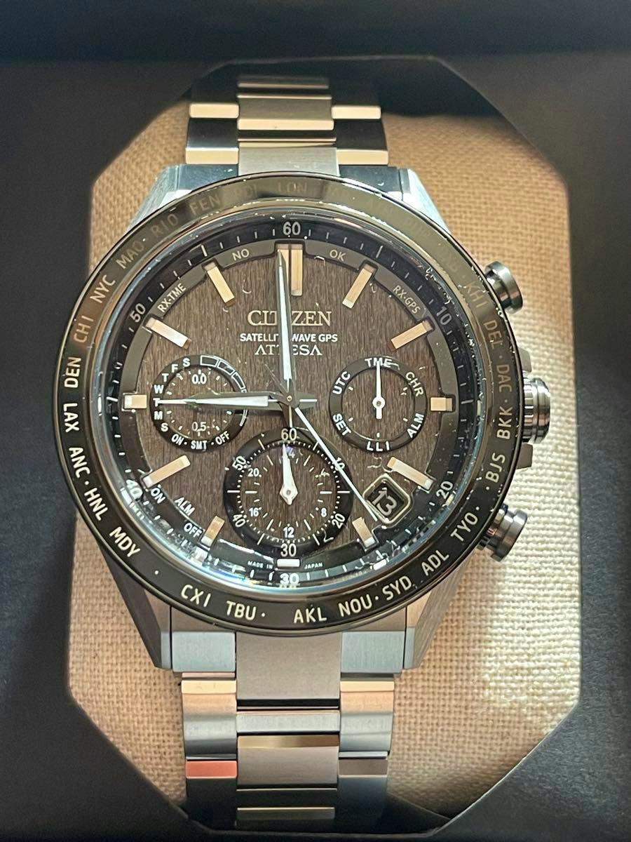 Close-up front view of the CC4058-67X metal-cased wristwatch with its metal bracelet displayed in the box.