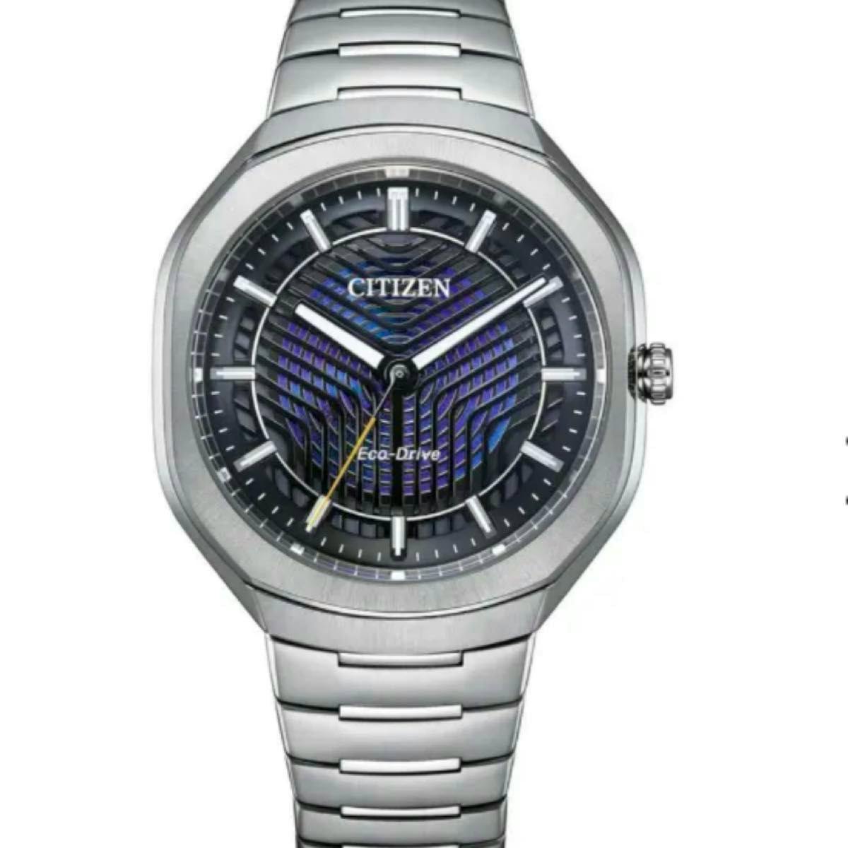 Front view of a Citizen Eco-Drive wristwatch showing a patterned dark blue dial, silver hands, and a stainless-steel bracelet.