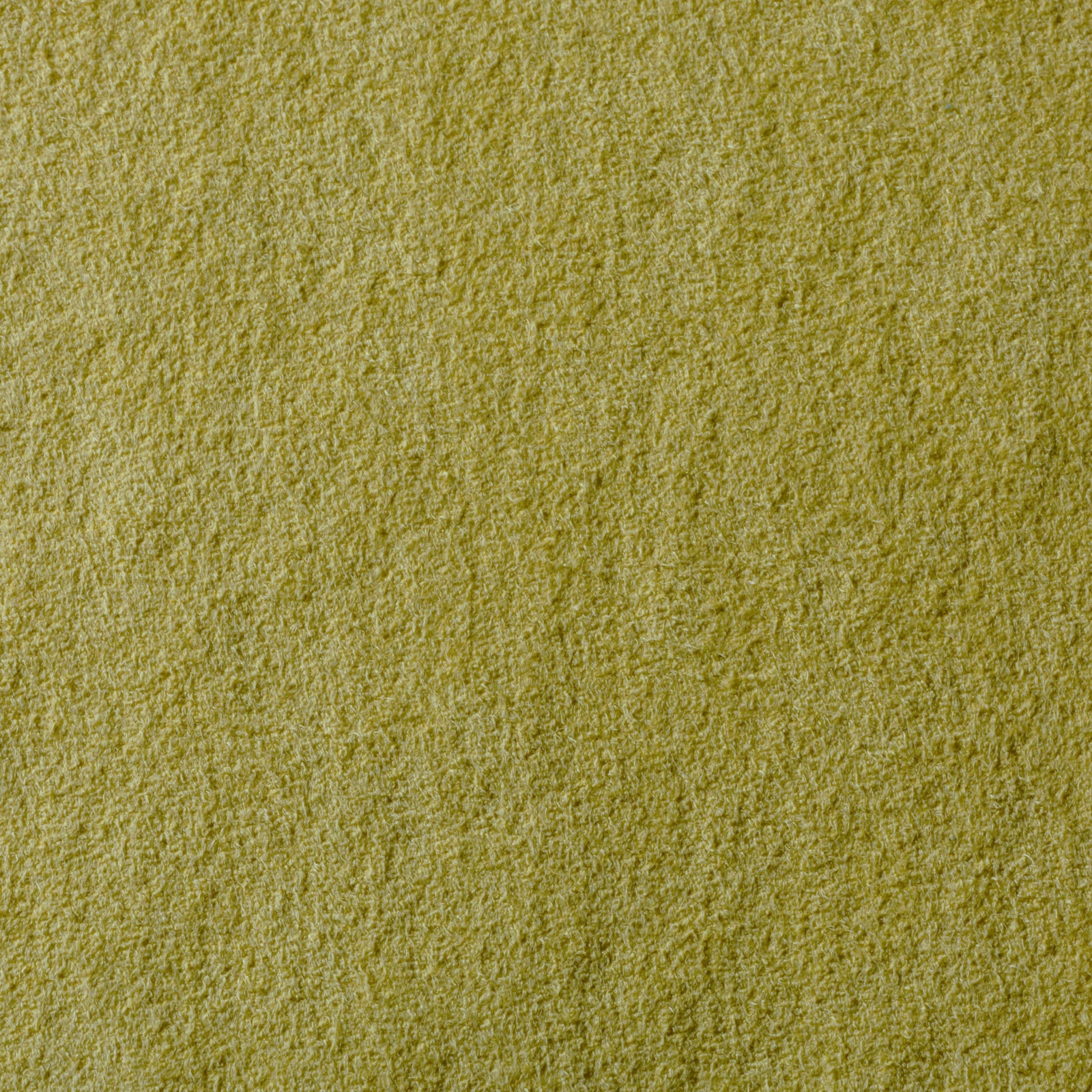 Close-up photo of citron-colored synthetic micro-suede fabric showing its textured surface.