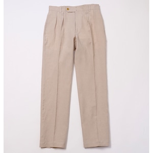 Full-length flat-lay photo of the Clarke men's cotton pants in natural color on a white background.