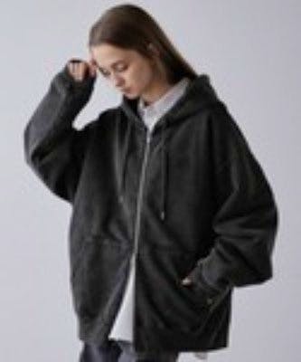 A model wearing the CLEL heavy weight logo embroidered full-zip hoodie in black, shown from the front.