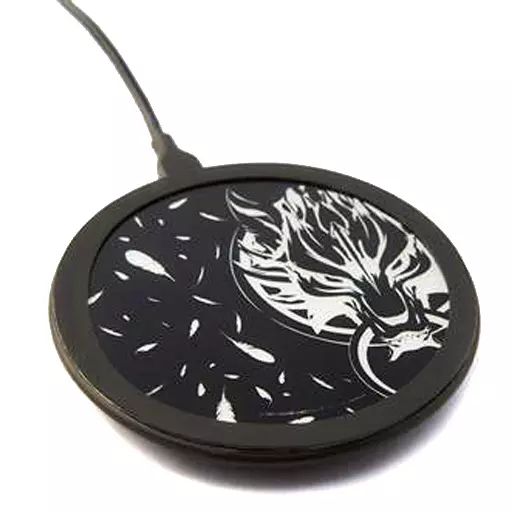 Wireless charging pad with a black-and-white Cloudy Wolf decorative design and an attached cable.