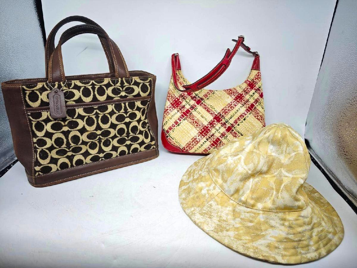 Three items displayed on a white background: a Coach signature-print lunch tote, a tweed shoulder bag, and a bucket hat.