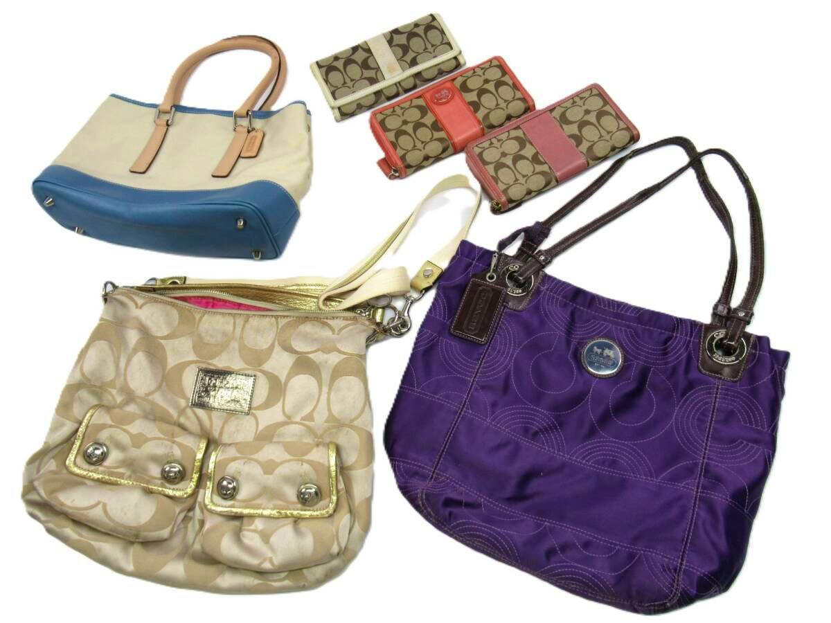 Six COACH items arranged on a white background: three handbags and three signature canvas wallets.