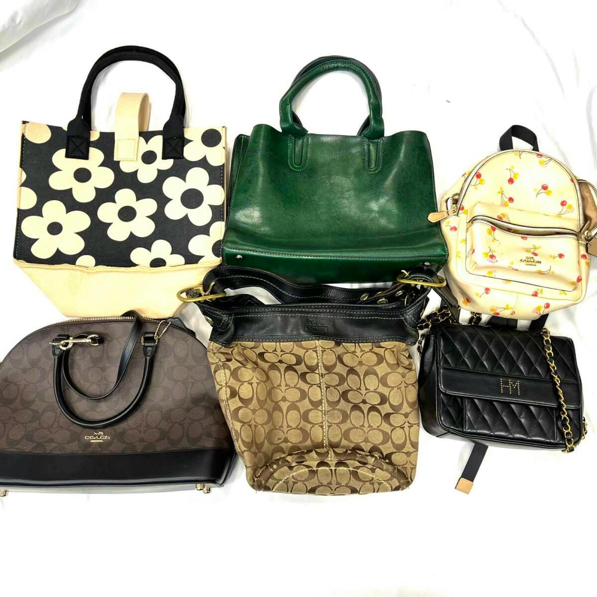 Six assorted bags, including Coach pieces, arranged on a white background.