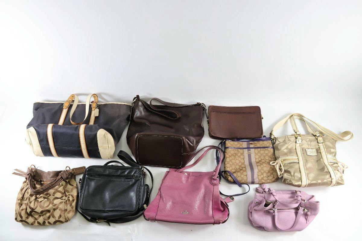 Nine assorted COACH bags in various styles and colors arranged on a white background.