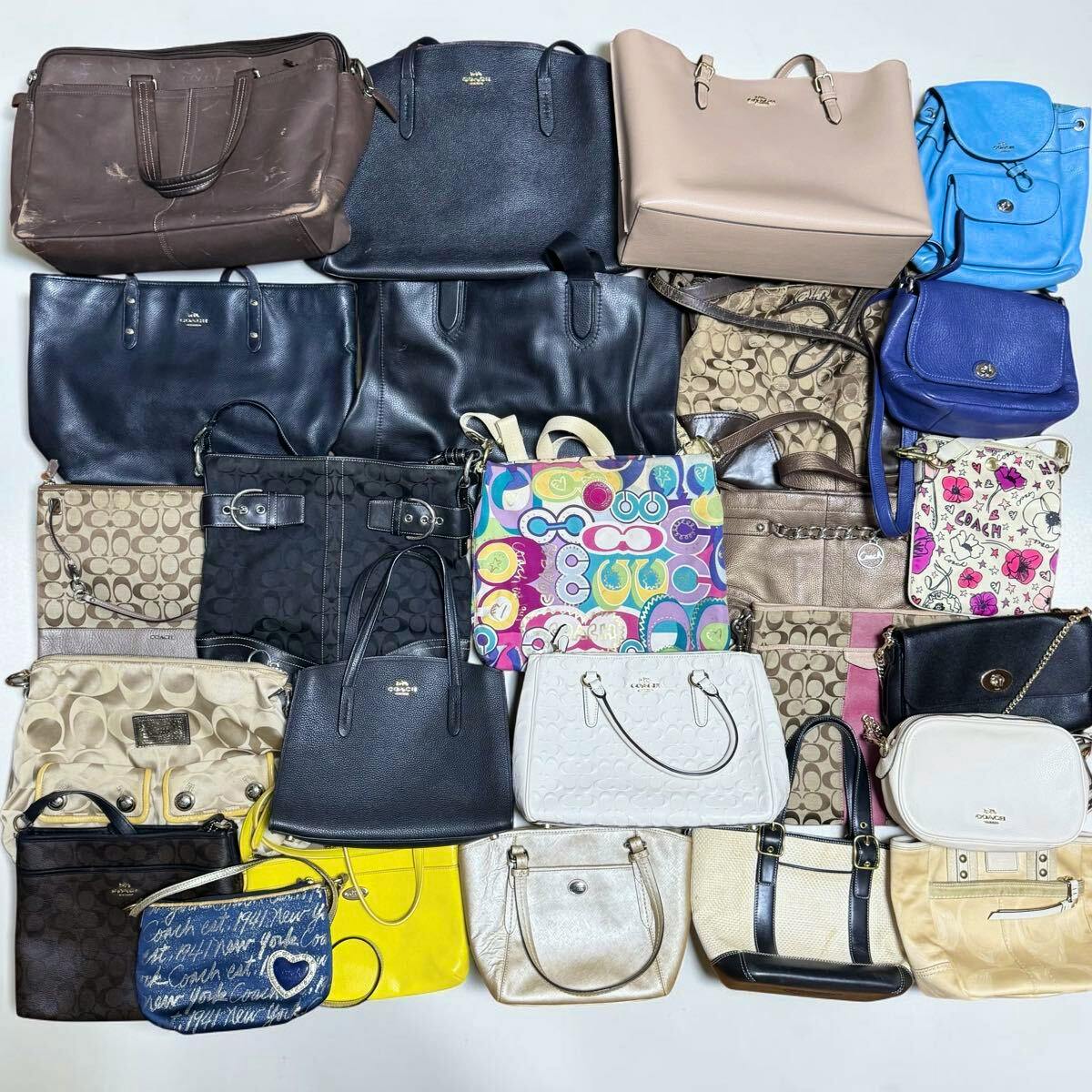 Flat lay of 25 COACH bags in various styles and colors arranged on a white background.