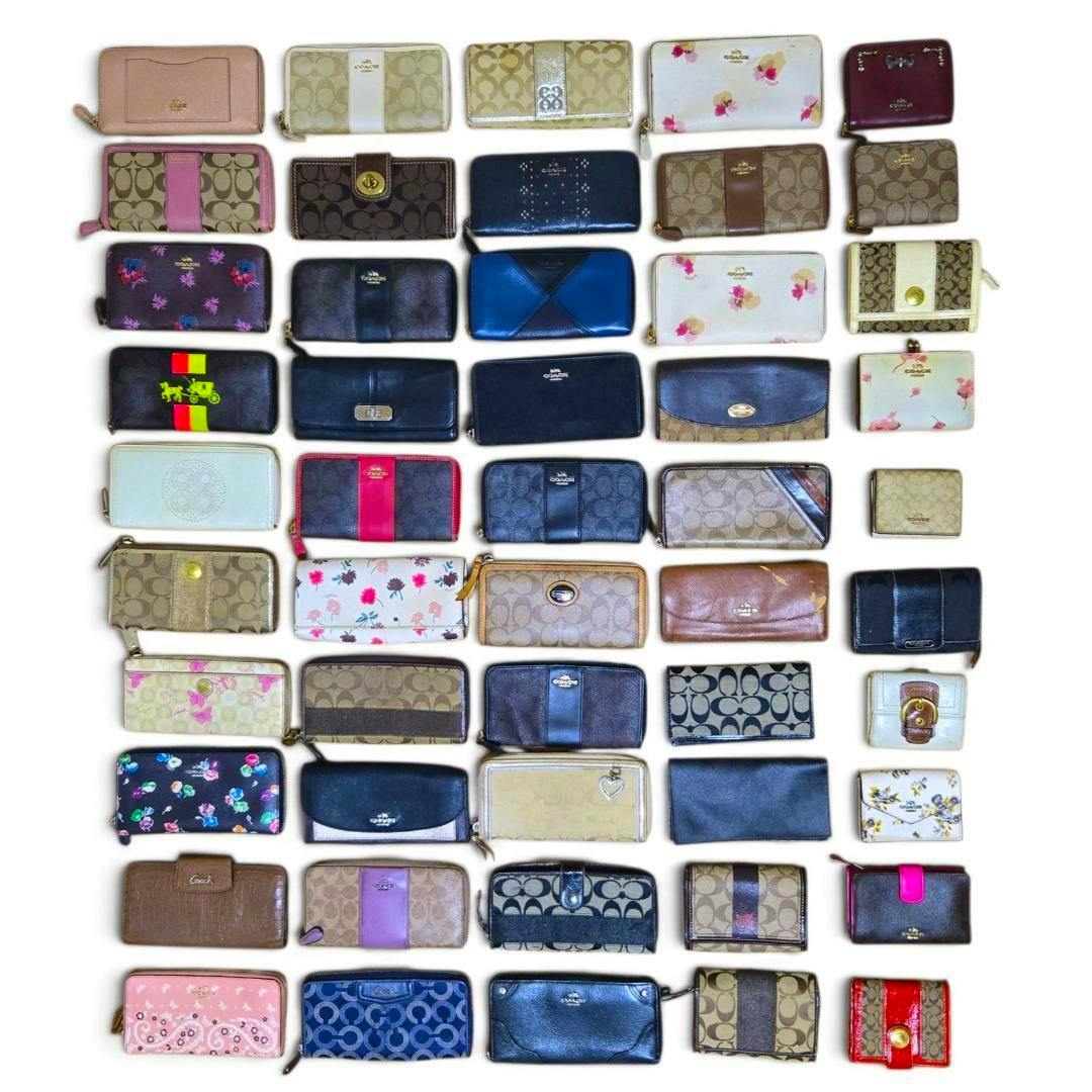 Many Coach wallets arranged in a grid on a white background, showing assorted colors, patterns, and styles.