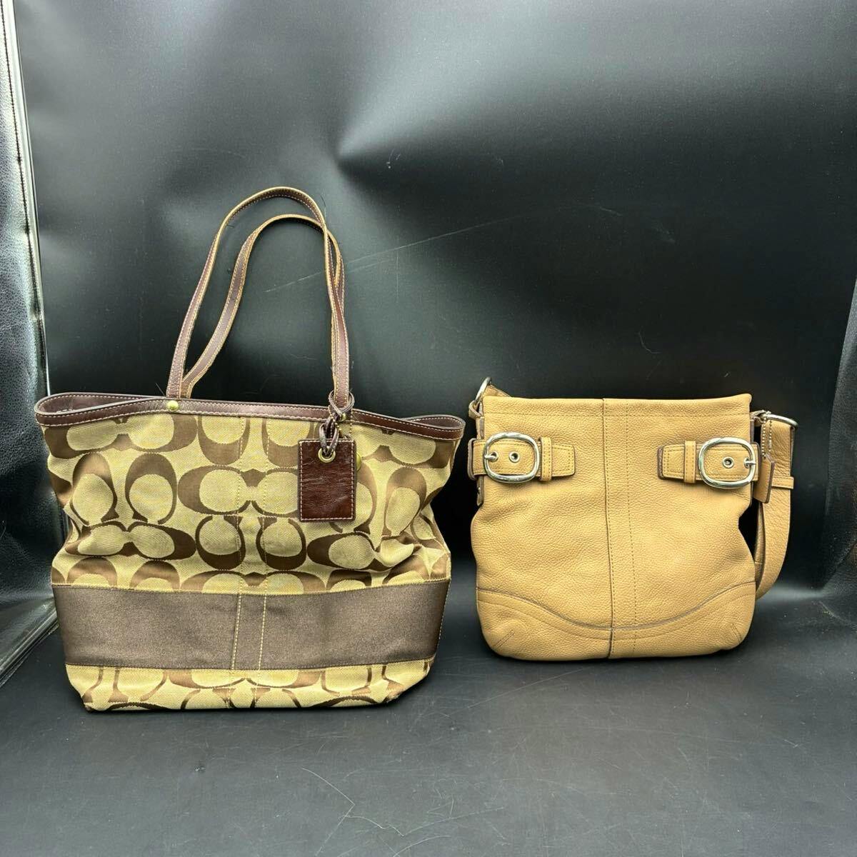 Two COACH bags photographed side by side on a black background: a brown canvas monogram tote (left) and a tan leather shoulder bag (right).
