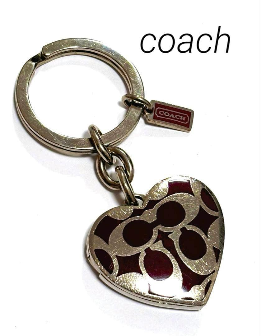COACH heart-shaped photo frame bag charm keyring (zinc alloy) in silver with red inset detailing.