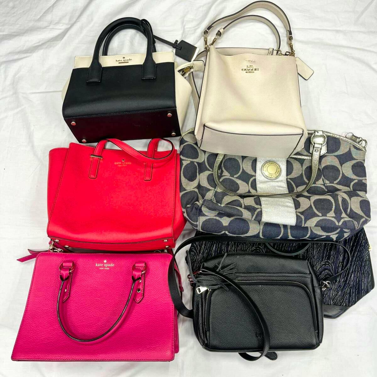 Seven assorted handbags (a canvas and leather bulk set including Coach and Kate Spade styles) laid out on a white background.