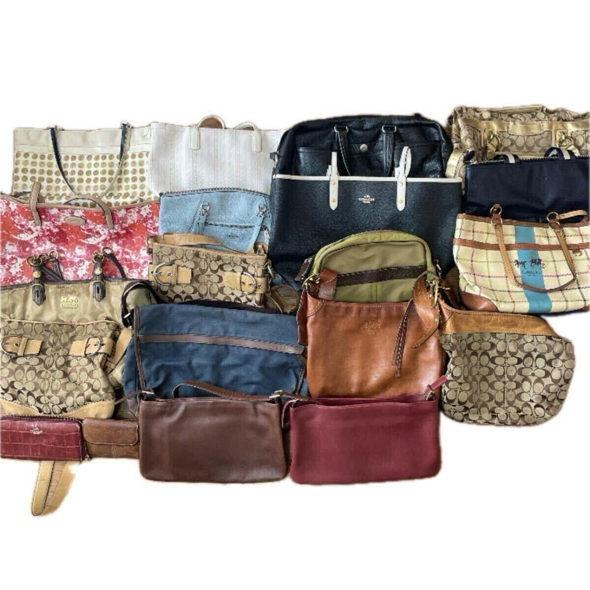 Multiple Coach bags and pouches arranged together showing various styles and materials.