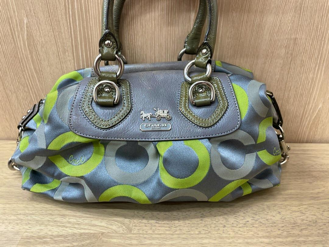 Front view of COACH Op Art Madison Sabrina 2-way shoulder/hand bag in lime green and gray canvas with circular pattern, leather handles, and a Coach logo plaque.