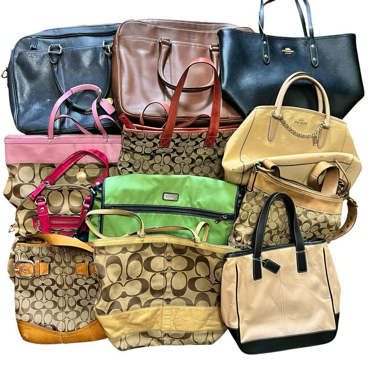Grouped COACH bags and totes arranged together showing signature canvas patterns and various leather styles.