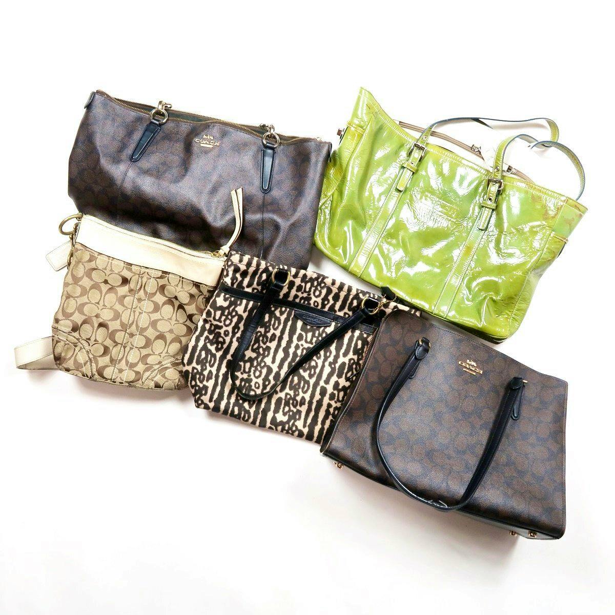Five COACH handbags and shoulder bags in various patterns and colors arranged on a white background.