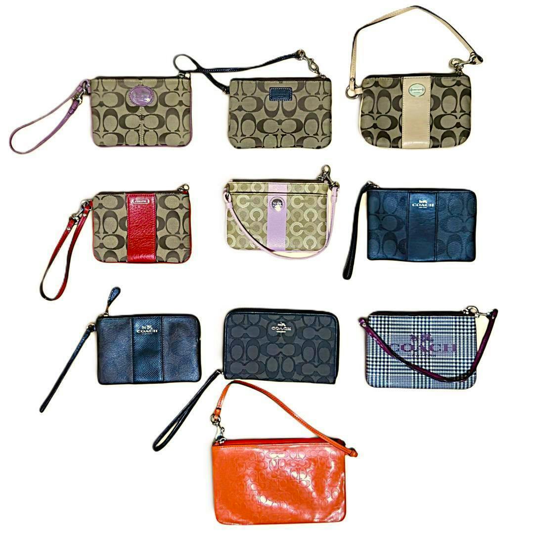 Ten COACH wristlet pouches in various signature patterns and colors arranged on a white background.