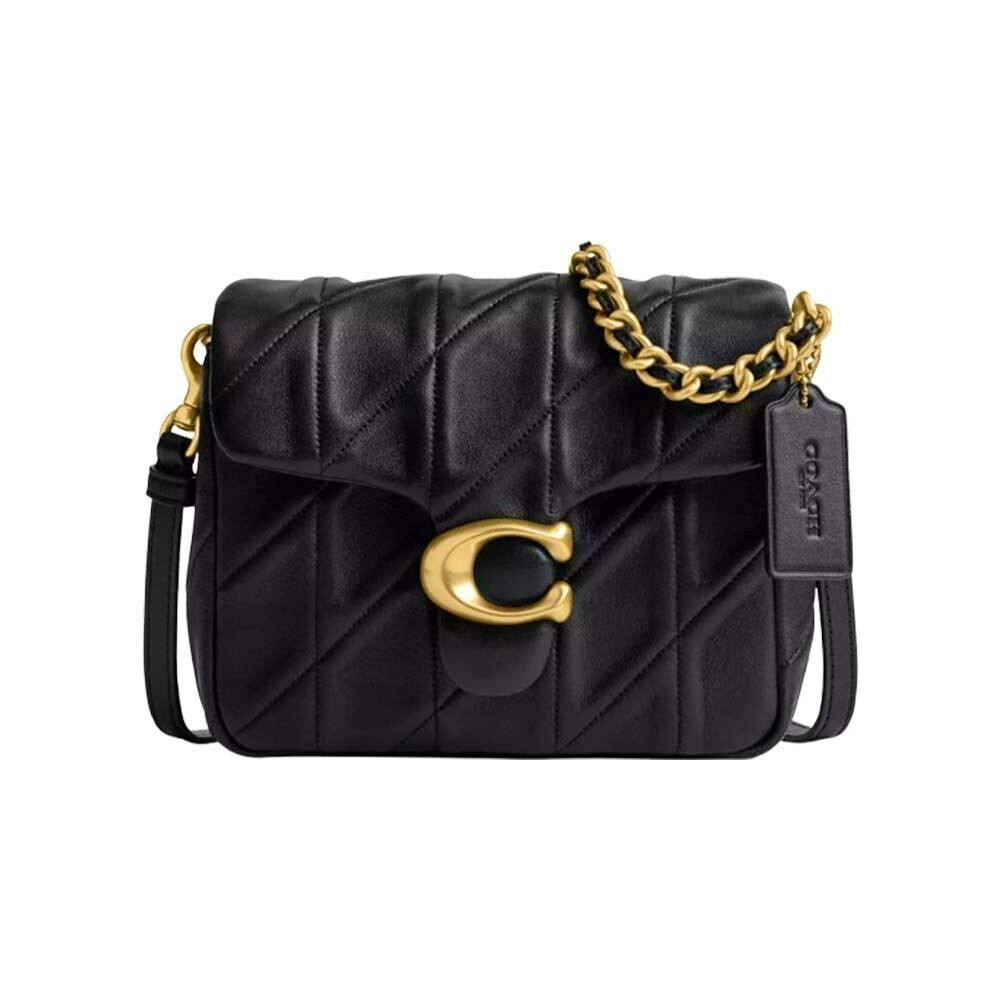 Front view of the COACH black quilted Tabby shoulder bag with gold hardware and a Coach leather tag.