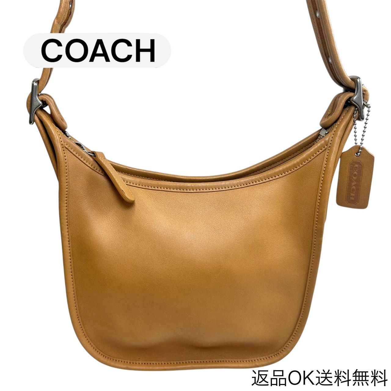 Beige COACH old leather shoulder bag photographed on a white background.