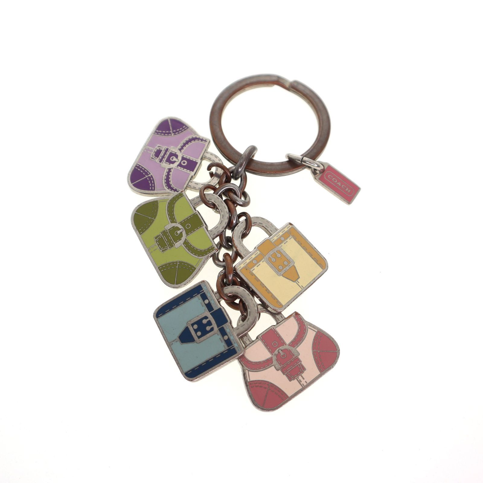 COACH Y2K keyring mini bag charm with five colorful bag-shaped charms and a small pink tag on a white background.