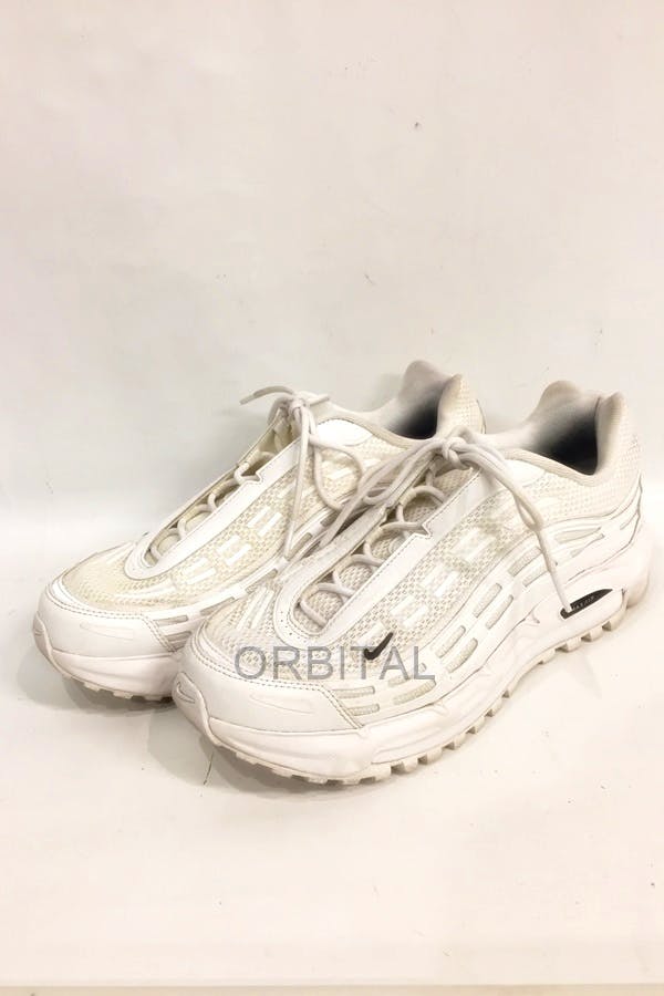 Pair of white COMME des GARCONS × NIKE Air Max TL 2.5 sneakers shown from a front-side angle.