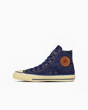 Side view of a navy high-top canvas sneaker (ALL STAR AGED BD HI / Wrangler) on a white background.