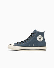 Blue high-top canvas sneaker (ALL STAR AGED CL HI) shown on a white background.