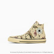 Side view of a beige high-top canvas sneaker with a Jurassic Park dinosaur print and a circular star ankle patch.