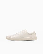 Side view of a white low-top canvas sneaker (ALL STAR COUPE OX) on a plain white background.