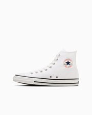 White high-top canvas sneaker shown in side profile on a white background.