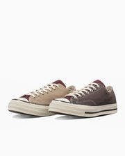 ALL STAR LGCY MC OX low-top canvas sneakers in beige and brown shown on a white background.