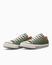 Pair of ALL STAR MANYLON OX canvas low-top sneakers shown from a three-quarter front view on a white background.