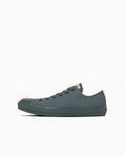 Side view of the ALL STAR MONOCOLORS OX low-top sneaker in a single solid color.